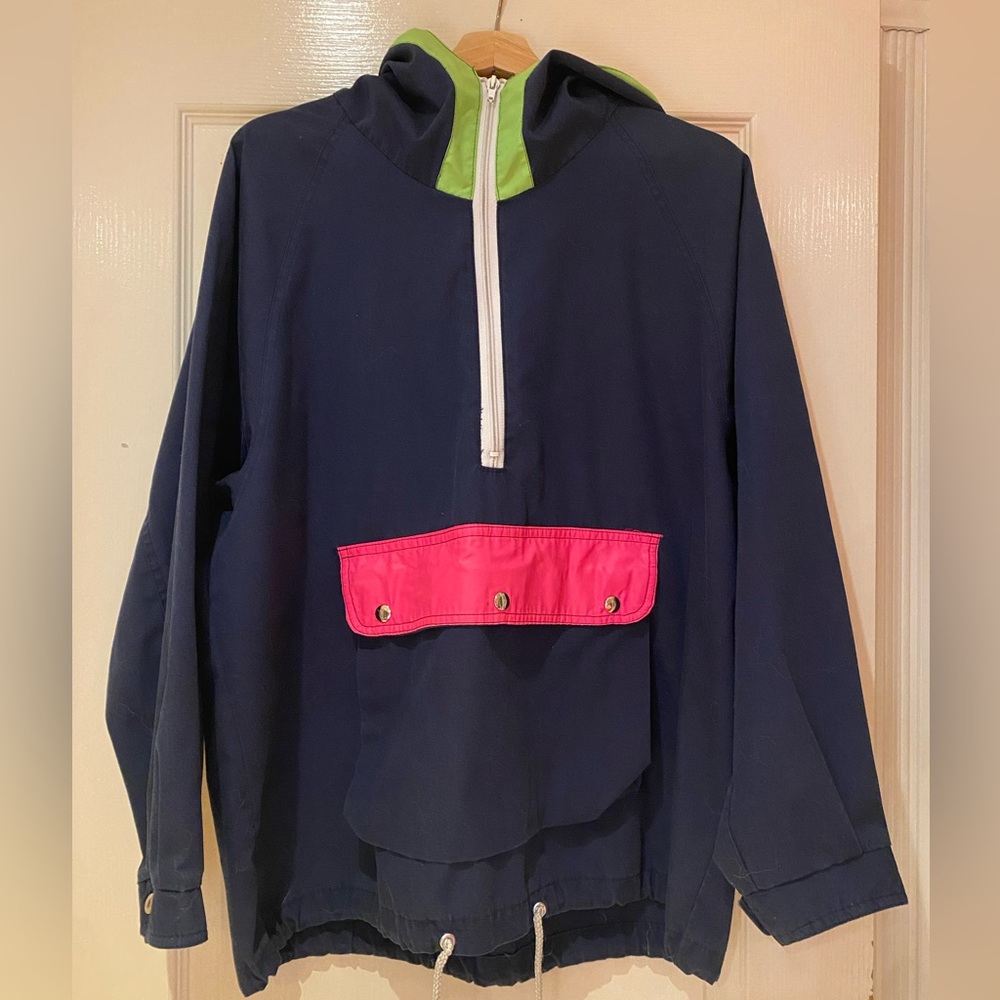 Navy K-way with fluorescent highlights